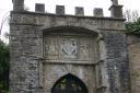 20041102_141902_watermouth_castle_side_gate_emblems.jpg
